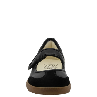 Aya in Black Milk Sneakerina
