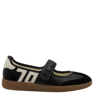 Aya in Black Milk Sneakerina